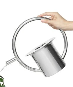 Umbra Gießkanne Quench - Edelstahl - Stainless Steel - 26,035cm x 24,892cm x 15,24cm 28 Umbra Gießkanne Quench - Edelstahl - Stainless Steel - 26,035cm x 24,892cm x 15,24cm -Gartenaccessoires Verkäufe 2022 1000316952 220112 13082700045 DETAILS P000000001000316952